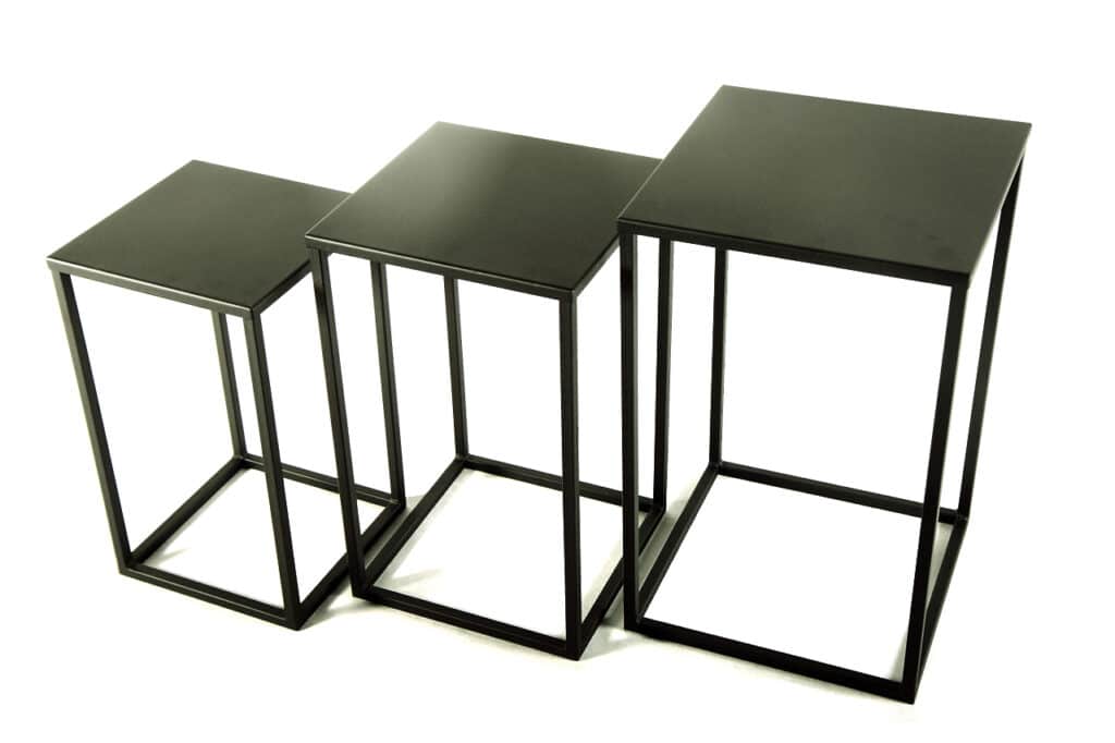Three nesting black steel pedestals for sculpture
