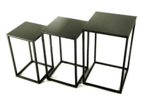 Three nesting black steel pedestals for sculpture